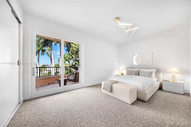 bedroom featuring carpet and access to exterior