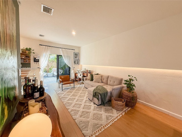 living room featuring wood-type flooring