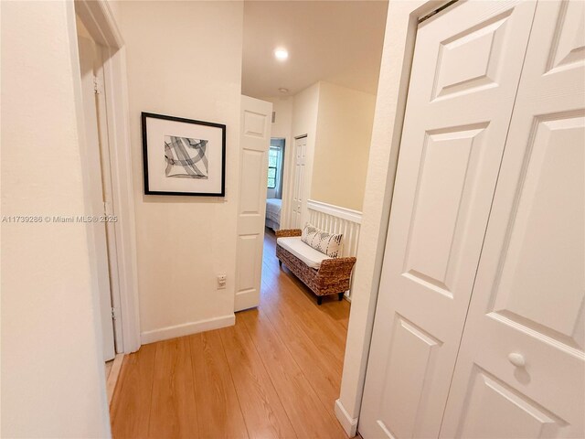 corridor featuring light wood-type flooring