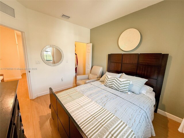 bedroom featuring light wood-type flooring