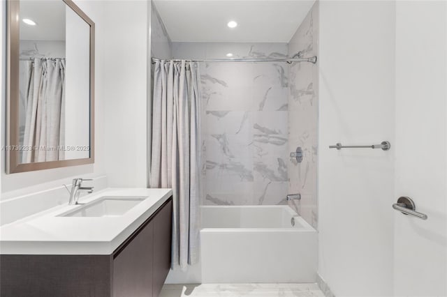 bathroom featuring vanity and shower / tub combo