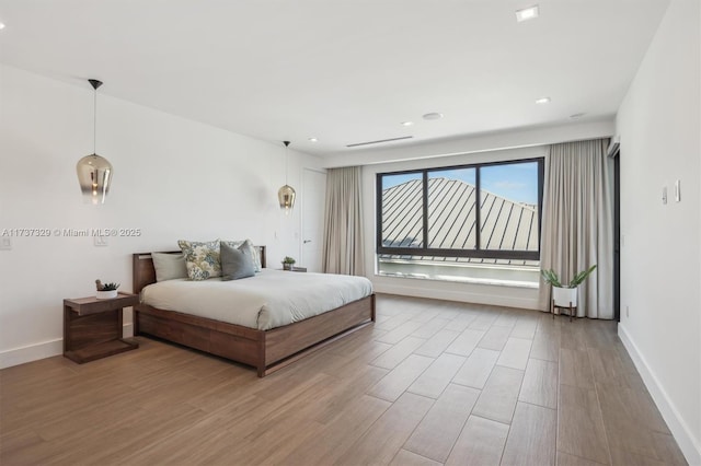 bedroom featuring light wood-type flooring