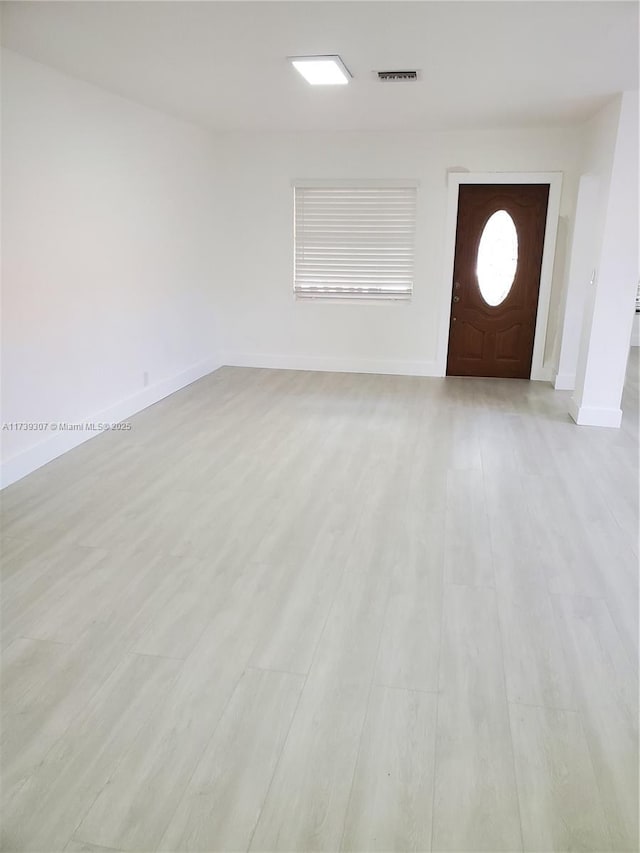 interior space with light hardwood / wood-style floors