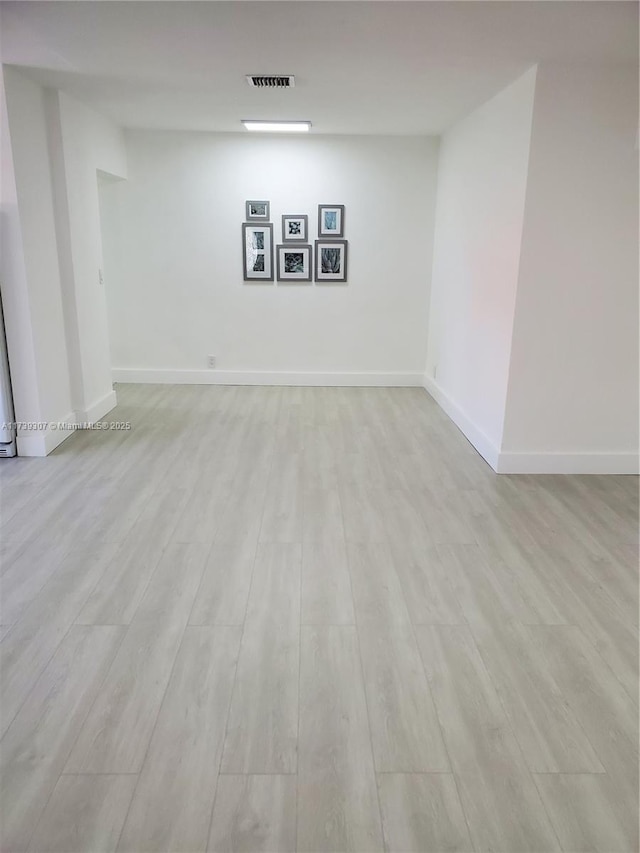 basement with light wood-type flooring