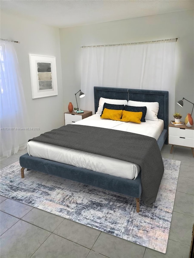 bedroom with tile patterned floors