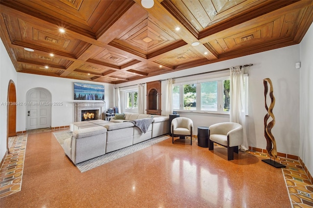 living room featuring wood ceiling, baseboards, arched walkways, and crown molding