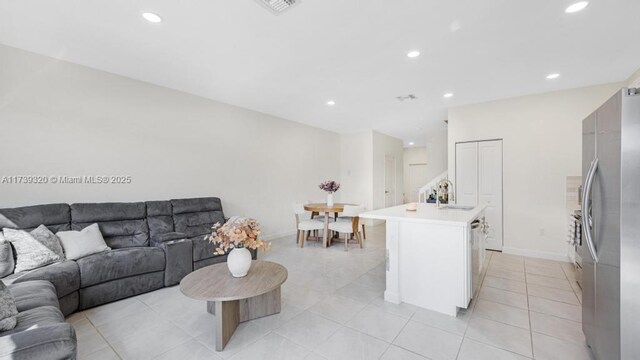 tiled living room with sink