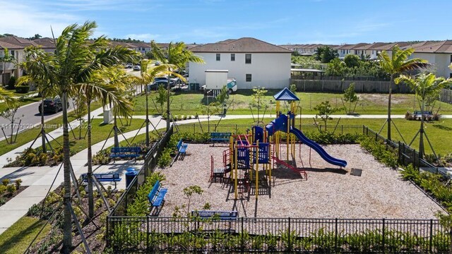 view of jungle gym with a lawn