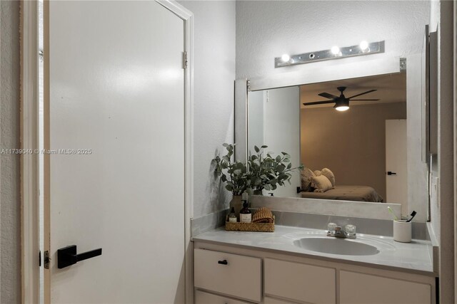 bathroom featuring vanity and ceiling fan