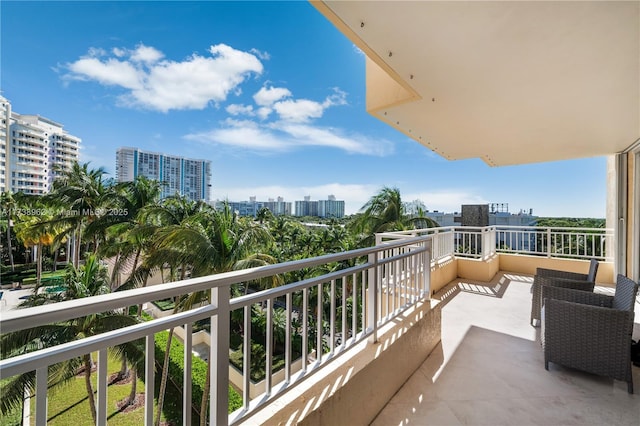 balcony featuring a city view