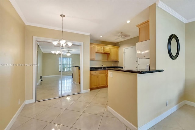 2171 NE 66th St Unit 801, Fort Lauderdale, FL 33308 - kitchen featuring crown molding, pendant lighting, kitchen peninsula, and light brown cabinets