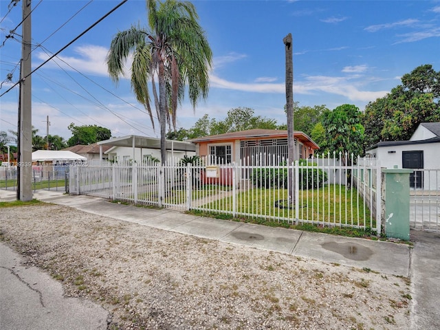 view of front of property with a front lawn