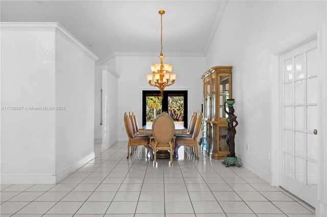 dining space with an inviting chandelier, french doors, crown molding, and light tile patterned flooring