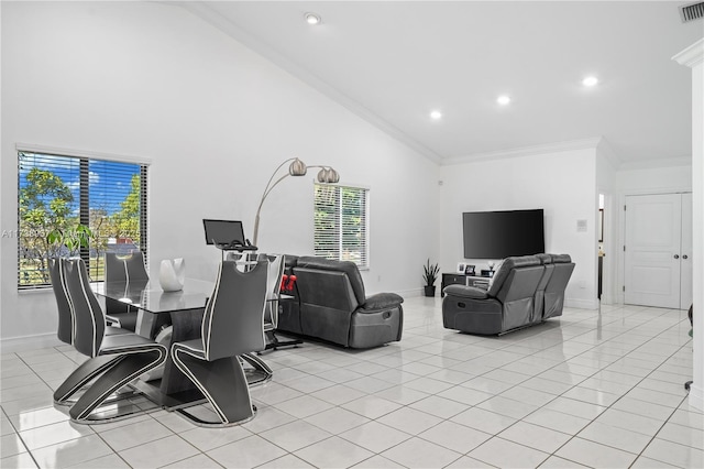 interior space with ornamental molding, high vaulted ceiling, baseboards, and light tile patterned floors