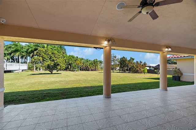 view of patio featuring a ceiling fan