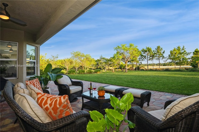 view of patio / terrace featuring ceiling fan and outdoor lounge area