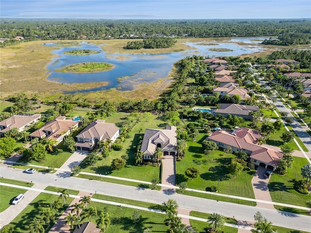 drone / aerial view with a water view