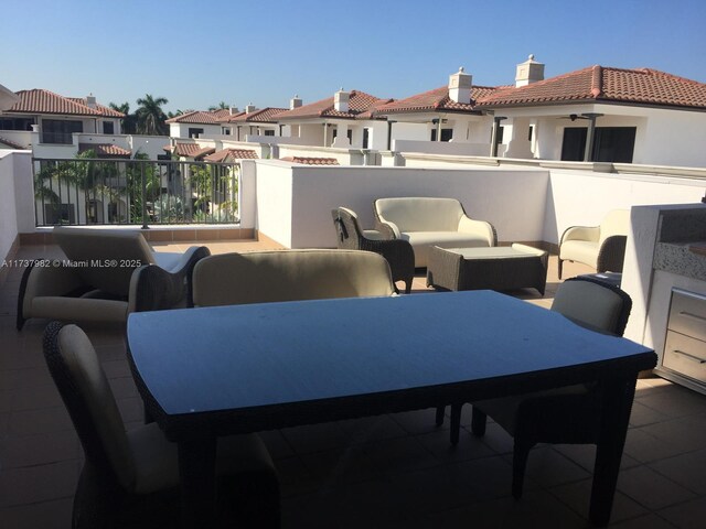 view of patio with a balcony and an outdoor living space