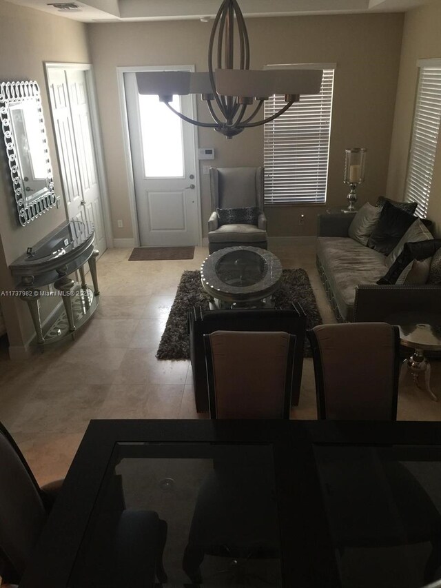 living room with a chandelier