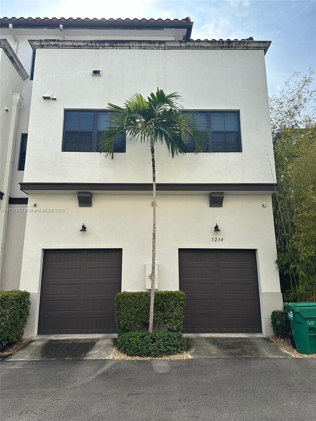 view of front of property featuring a garage