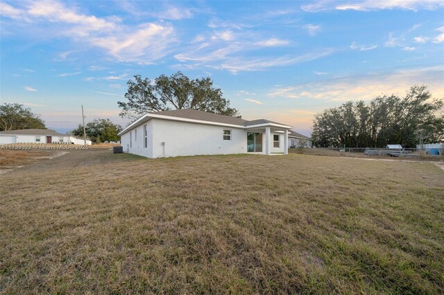 exterior space featuring a lawn