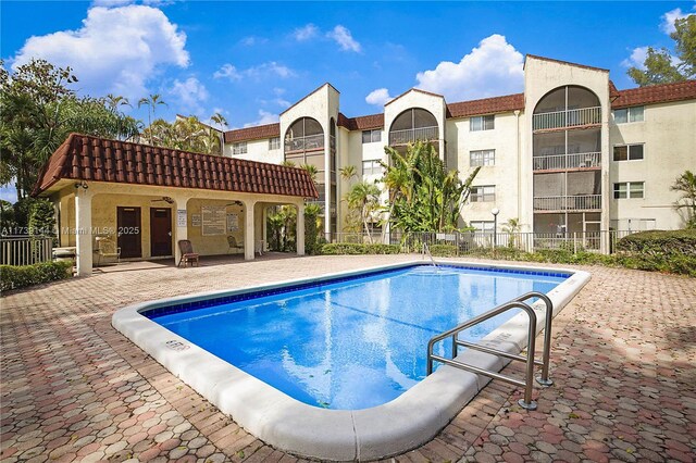 view of pool featuring a patio