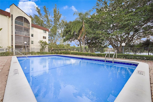 community pool with fence