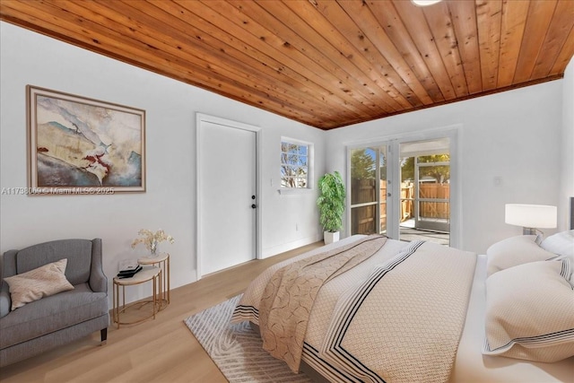 bedroom featuring wood ceiling, access to exterior, french doors, and light wood-type flooring