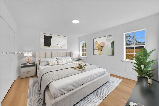 bedroom featuring light wood-type flooring