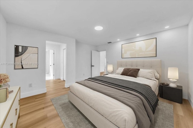 bedroom featuring light hardwood / wood-style flooring