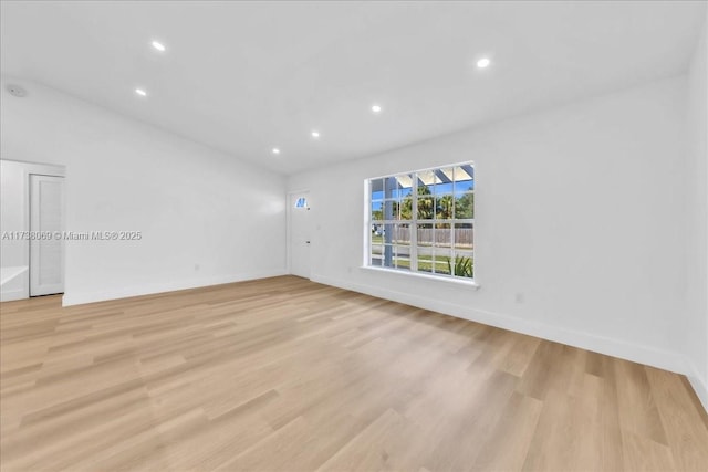 empty room with light wood-type flooring