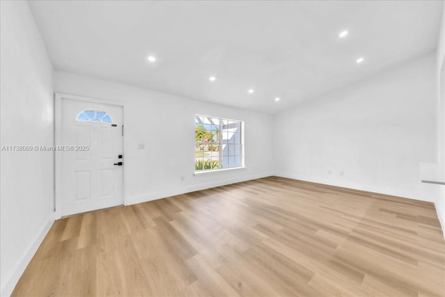 entrance foyer with light wood-type flooring