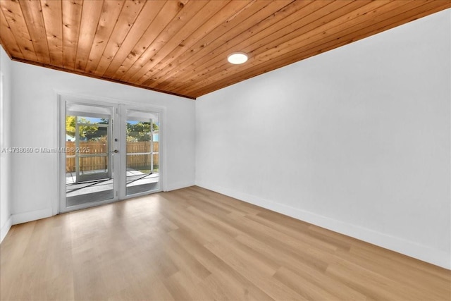 unfurnished room featuring crown molding, wooden ceiling, and light hardwood / wood-style floors