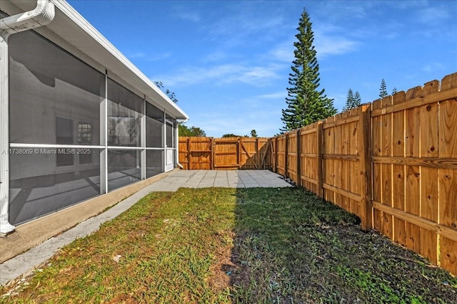 view of yard with a sunroom