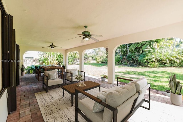 view of patio with an outdoor hangout area and ceiling fan