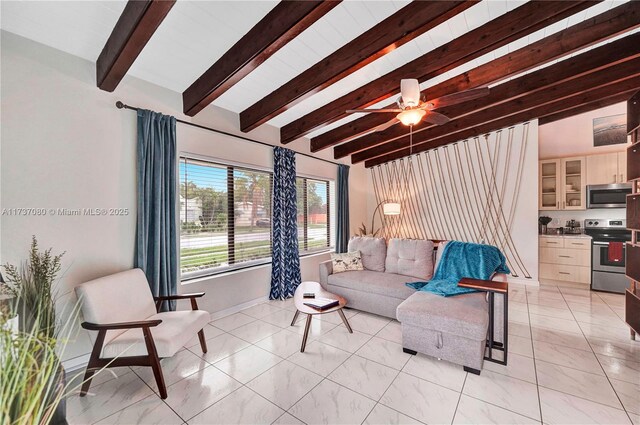 living room featuring ceiling fan and vaulted ceiling with beams