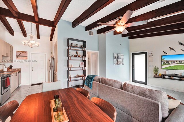 tiled bedroom featuring ceiling fan