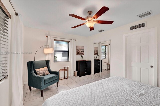 living room with ceiling fan and lofted ceiling with beams