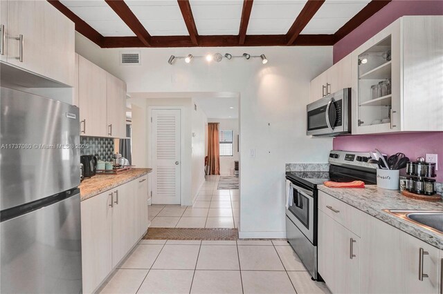 tiled bedroom with ceiling fan