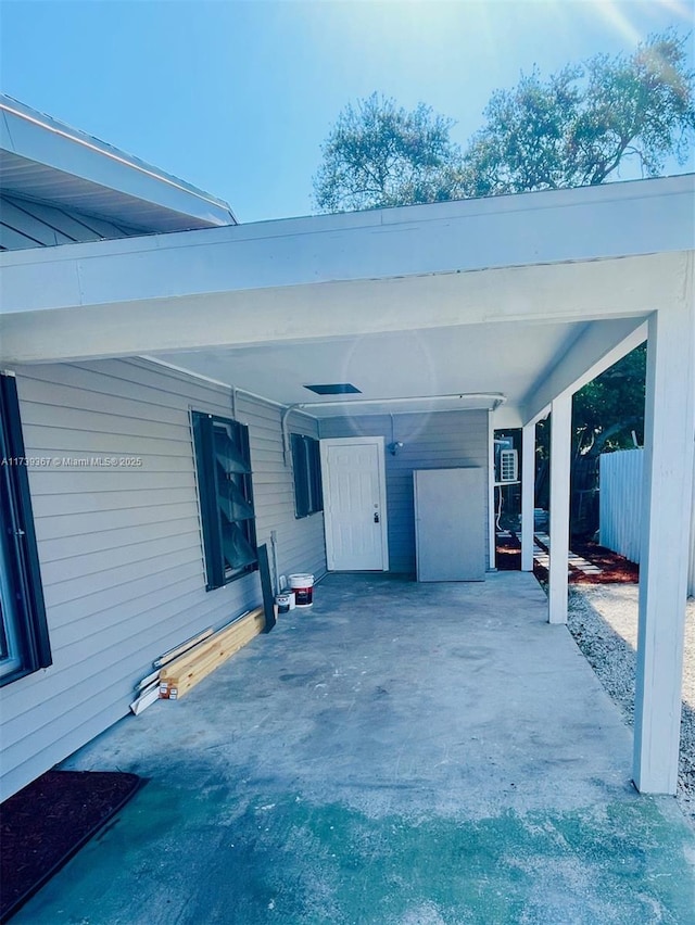 view of property exterior featuring a carport