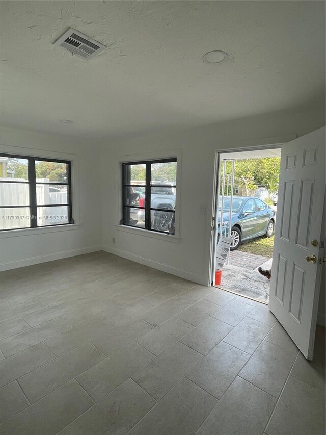 foyer featuring a healthy amount of sunlight