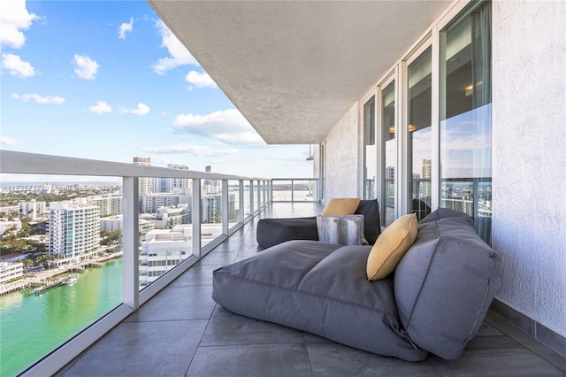 balcony featuring a water view