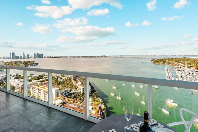 balcony featuring a water view