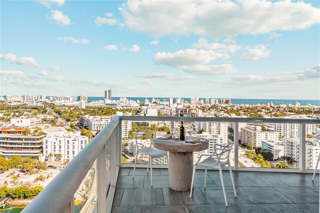 balcony featuring a water view