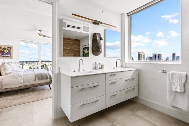 bathroom featuring vanity and ceiling fan