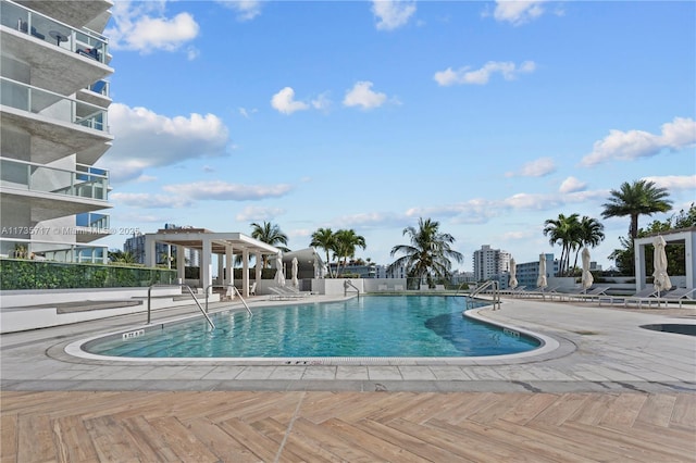 view of pool featuring a patio