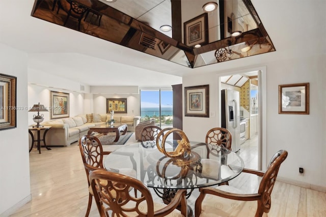 dining space featuring light hardwood / wood-style flooring