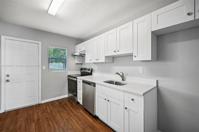 kitchen with white cabinetry, sink, dark wood-type flooring, and appliances with stainless steel finishes