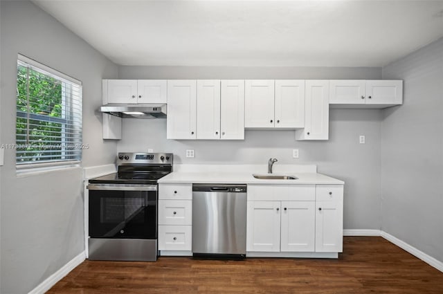 kitchen featuring white cabinetry, appliances with stainless steel finishes, and sink