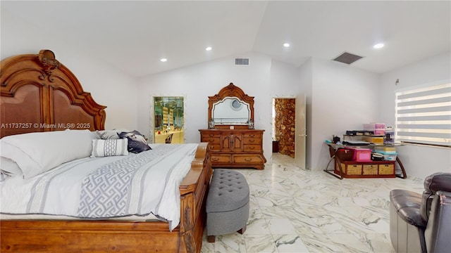 bedroom with vaulted ceiling